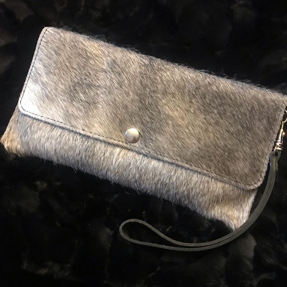 Jill’s Homestead Carly Clutch. Soft grey hide with deep plum leather back.